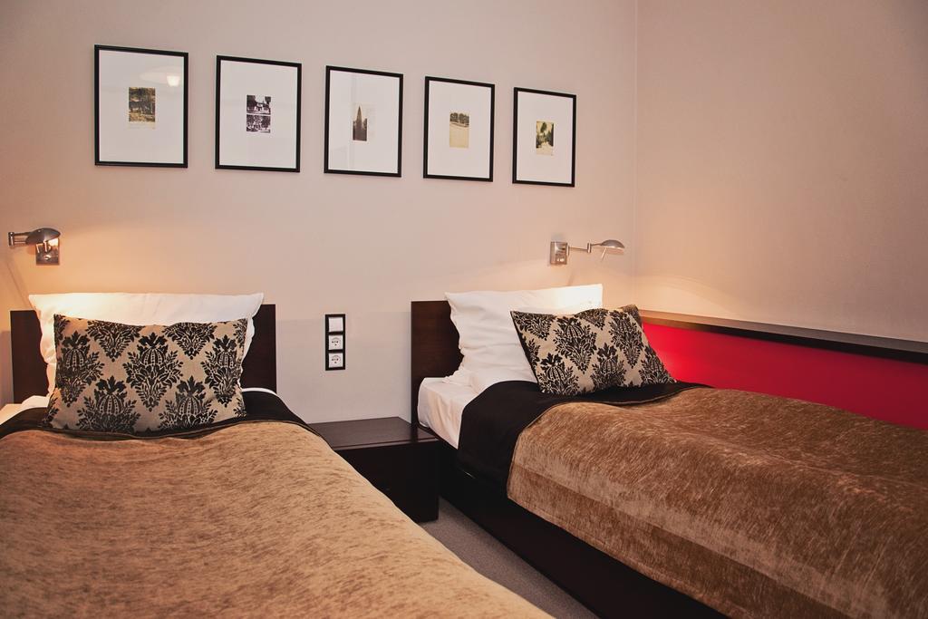 Hotel Pod Lwem Elblag Quarto foto